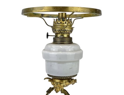 Lot 61 - A 19th century gilt brass cherub oil lamp.