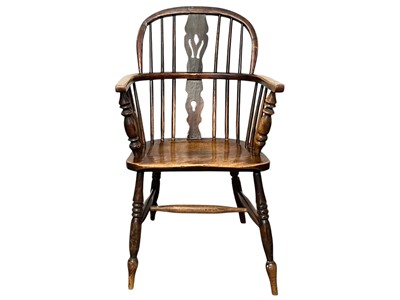 Lot 343 - A Victorian fruitwood and ash Windsor armchair.