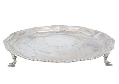 Lot 8 - A George II silver waiter by John Cafe.