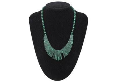 Lot 43 - A selection of four bead necklaces.