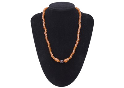 Lot 43 - A selection of four bead necklaces.