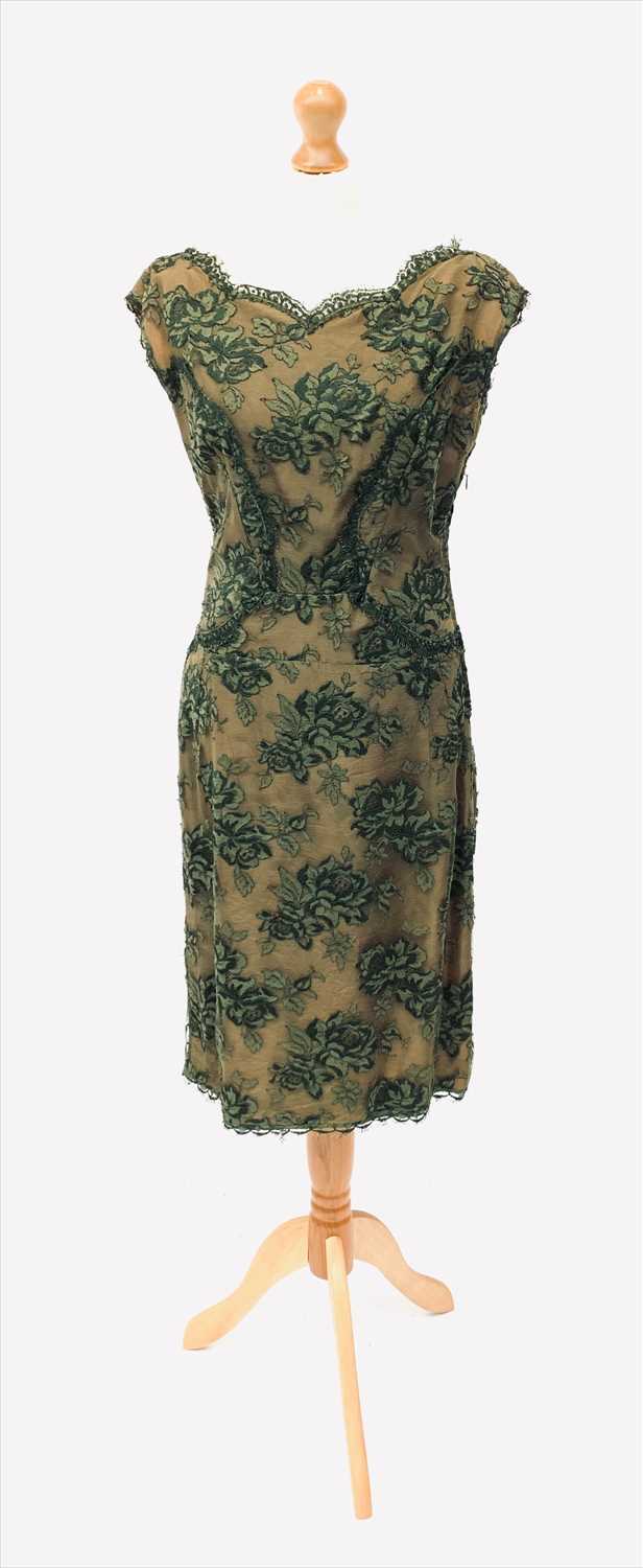 Lot 3027 - A vintage olive green silk lined lace dress,...