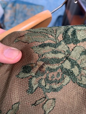 Lot 3027 - A vintage olive green silk lined lace dress,...