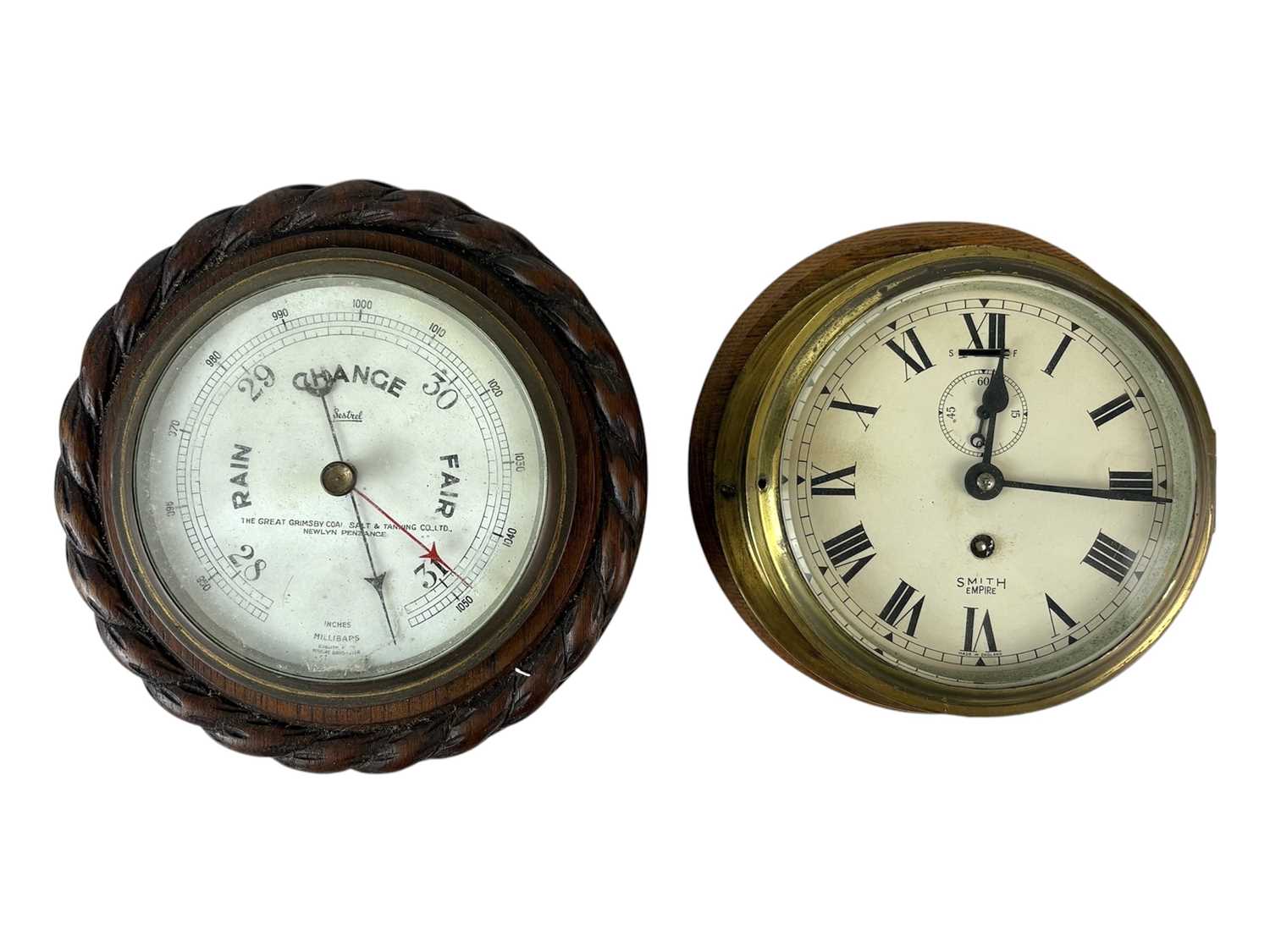 Lot 468 - A Smith Empire brass bulkhead timepiece.
