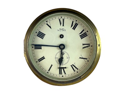 Lot 468 - A Smith Empire brass bulkhead timepiece.
