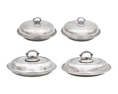 Lot 153 - A pair of silver-plated graduated food domes, two oval trays, and an oval galleried tray.