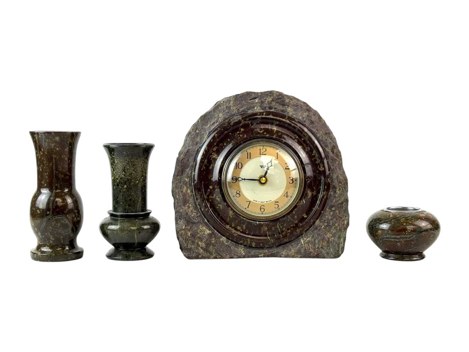 Lot 94 - A Cornish serpentine clock case.