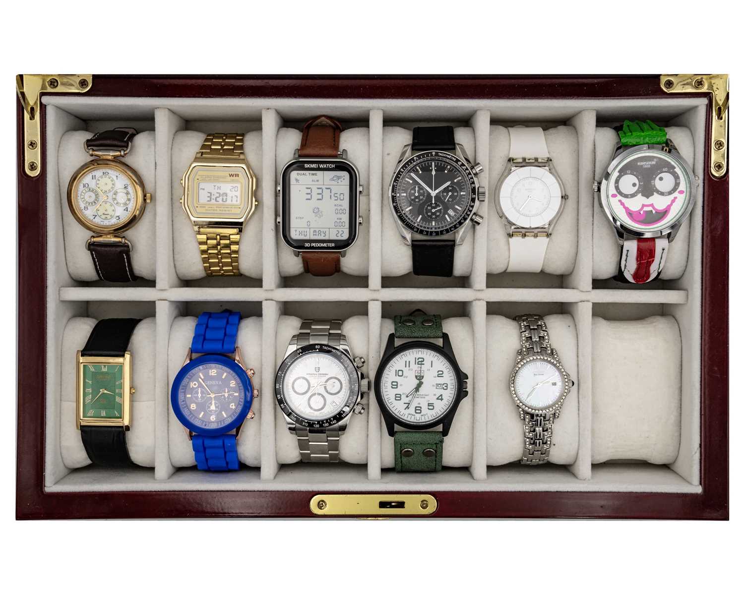 Lot 1034 - A collection of eleven quartz wristwatches, within a 12 section watch storage box.