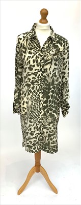 Lot 3043 - A green and cream leopard print silk shirt...