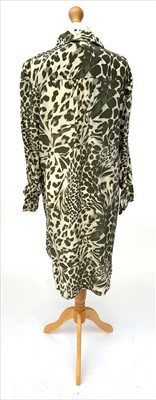 Lot 3043 - A green and cream leopard print silk shirt...