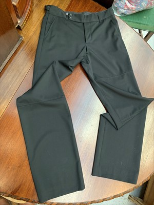 Lot 3046 - A pair of smart straight leg black wool...