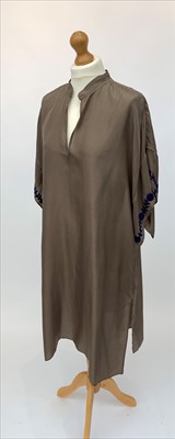 Lot 3054 - A mink brown silk top with blue embroidery by...