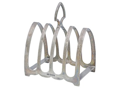 Lot 23 - A George V silver four section toast rack by Viner's Ltd.