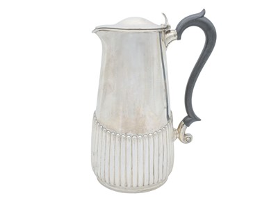 Lot 25 - A George V silver half-fluted hot water pot by Manoah Rhodes & Sons Ltd.