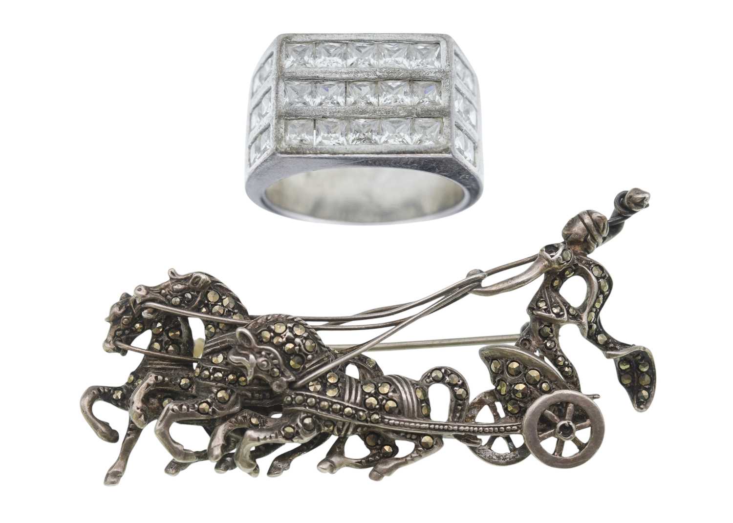 Lot 15 - A silver and marcasite chariot brooch, and a silver CZ gentleman's ring.