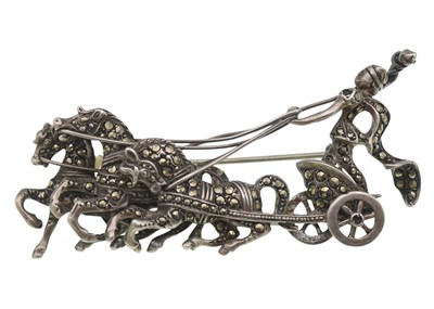 Lot 15 - A silver and marcasite chariot brooch, and a silver CZ gentleman's ring.