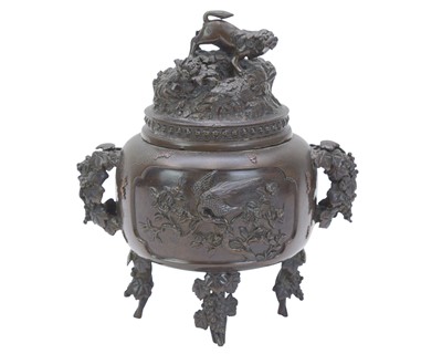 Lot 559 - A Japanese Bronze censer and cover.