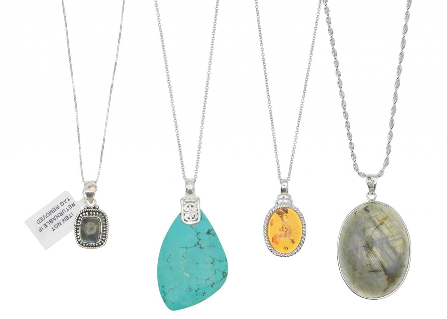 Lot 31 - A selection of four silver pendant necklaces.