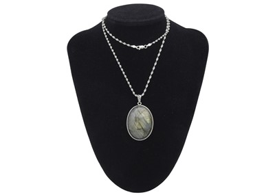 Lot 31 - A selection of four silver pendant necklaces.