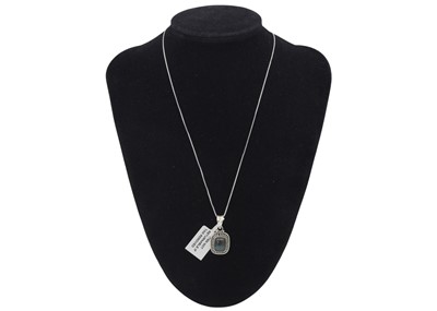 Lot 31 - A selection of four silver pendant necklaces.