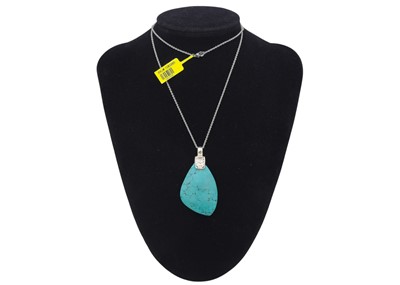 Lot 31 - A selection of four silver pendant necklaces.