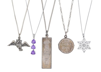 Lot 106 - A silver snowflake with a tiny diamonds pendant necklace, and four other silver necklaces.