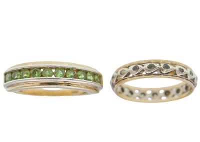 Lot 103 - A gold-plated silver tsavorite garnet ring and a silver and gold band ring.