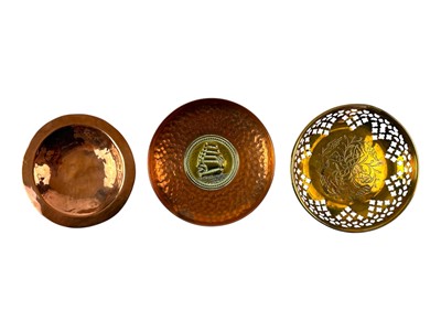 Lot 80 - Two Joseph Sankey and Sons graduated copper jugs.