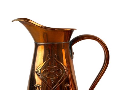 Lot 80 - Two Joseph Sankey and Sons graduated copper jugs.