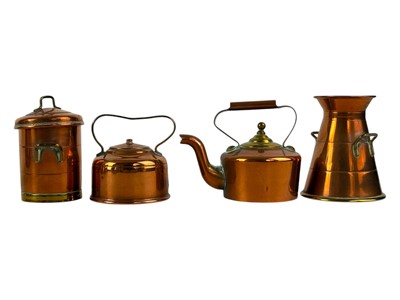 Lot 80 - Two Joseph Sankey and Sons graduated copper jugs.