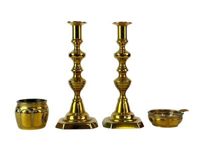 Lot 80 - Two Joseph Sankey and Sons graduated copper jugs.