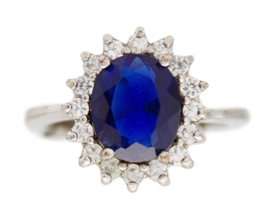 Lot 23 - Two M&S white metal gem rings.