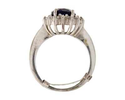 Lot 23 - Two M&S white metal gem rings.