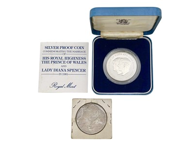 Lot 163 - A Royal Mint Charles & Diana 1981 silver proof crown, and a 1922 USA silver 'Peace' dollar.