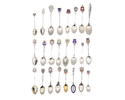 Lot 45 - A collection of 24 silver and enamel souvenir teaspoons.