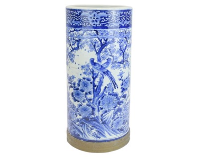 Lot 653 - A Japanese blue and white porcelain umbrella stand.