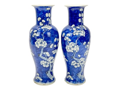 Lot 581 - A pair of Chinese Prunus pattern vases.