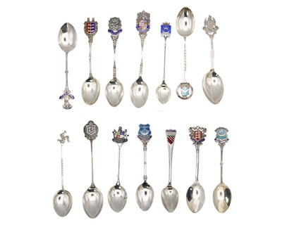 Lot 47 - A collection of 14 silver and enamel souvenir teaspoons.