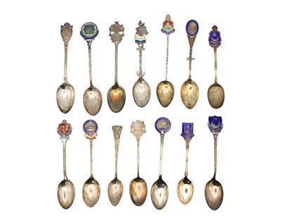 Lot 52 - A collection of 27 silver and enamel souvenir teaspoons.