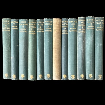 Lot 113 - 12 Arthur Ransome novels.