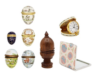 Lot 212 - A Halcyon Days Enamel collection of four Easter Egg trinket boxes.