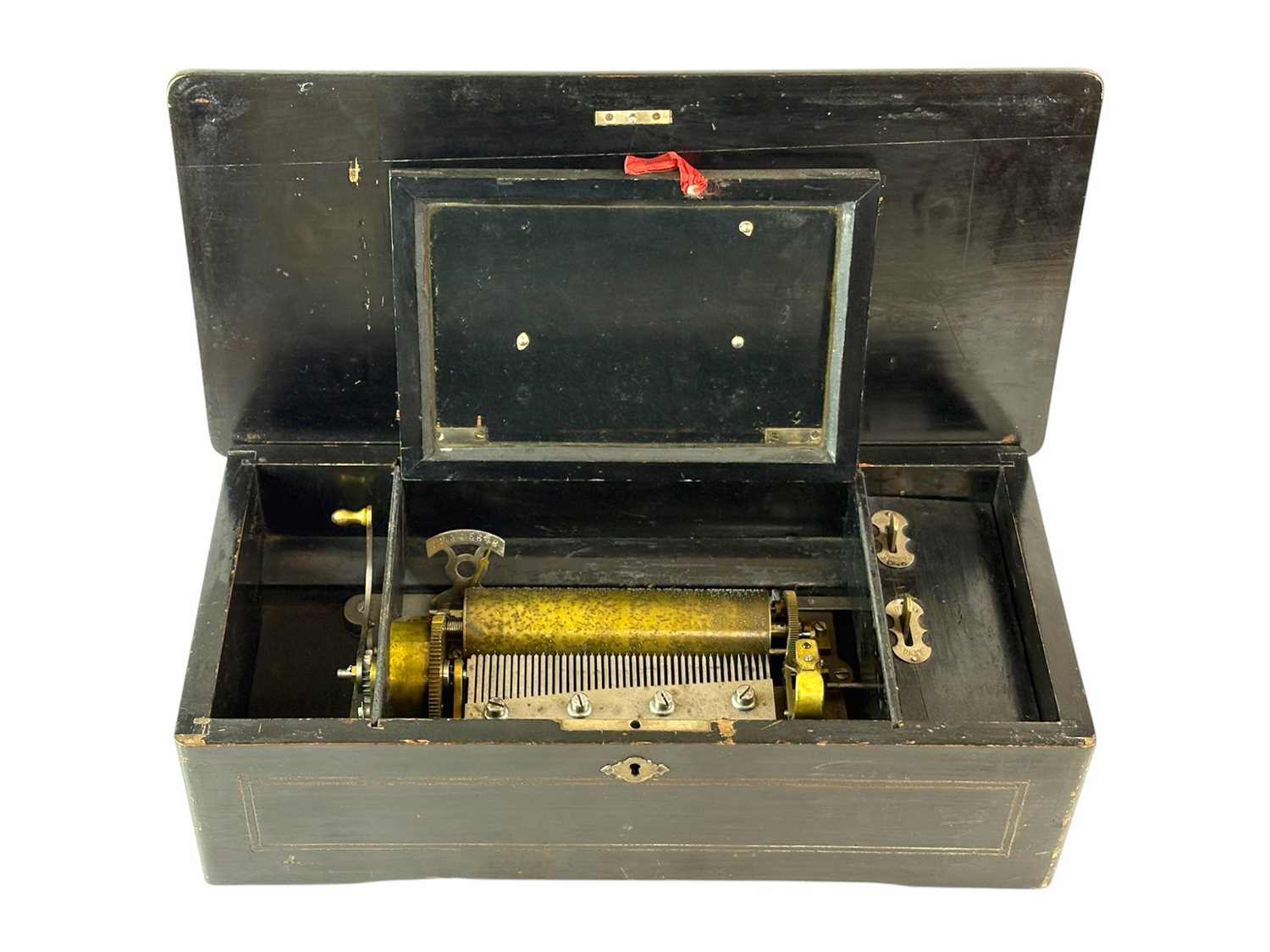 Lot 93 - A Swiss music box.