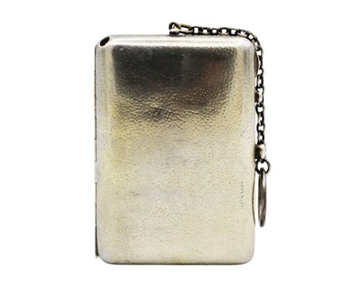 Lot 211 - An Edwardian silver gilt combination compact purse by Cohen & Charles.
