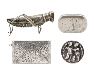 Lot 210 - A selection of four small silver items.