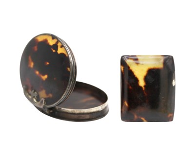 Lot 188 - A Georgian silver and tortoiseshell oval hinge-lidded box and a tortoiseshell and horn snuff box.