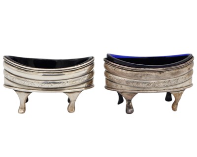 Lot 72 - A pair of George III silver boat shaped salts by Solomon Hougham.