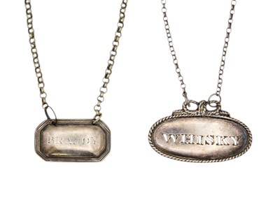 Lot 196 - Two Georgian silver spirit labels.