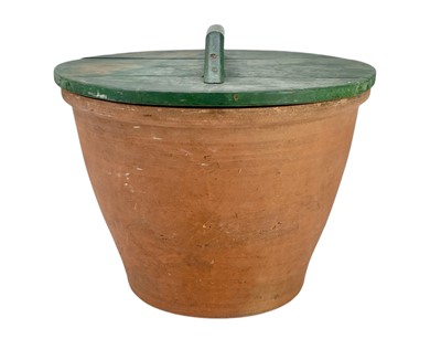 Lot 114 - A terracotta bread crock.