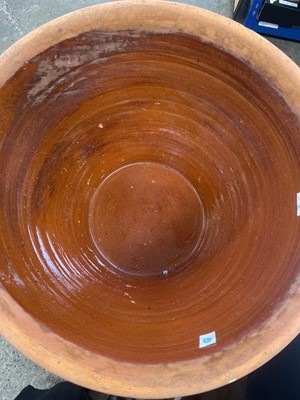 Lot 114 - A terracotta bread crock.