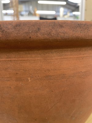 Lot 114 - A terracotta bread crock.